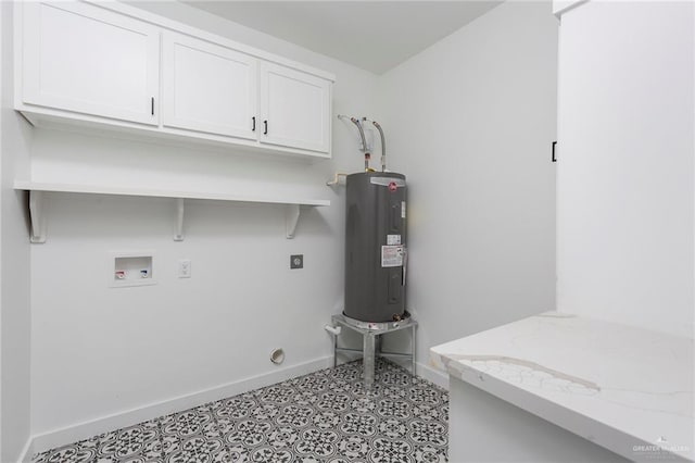 9206 N 25th Ln, Mcallen, TX 78504 - laundry room with hookup for an electric dryer, water heater, cabinet space, baseboards, and hookup for a washing machine