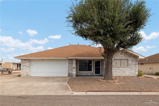 ranch-style home with a garage