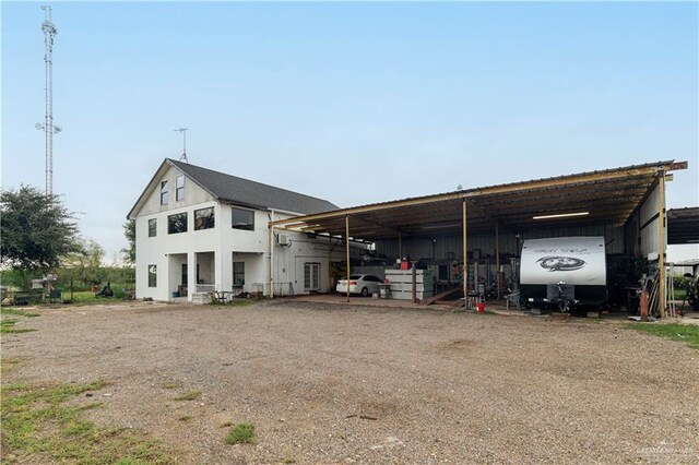 exterior space featuring a carport