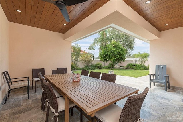 view of patio / terrace featuring a ceiling fan and outdoor dining space