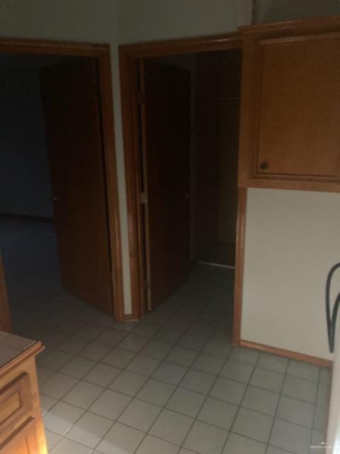 kitchen with light tile patterned floors