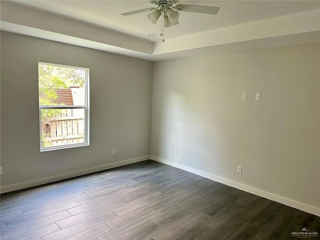 unfurnished room featuring hardwood / wood-style floors and ceiling fan