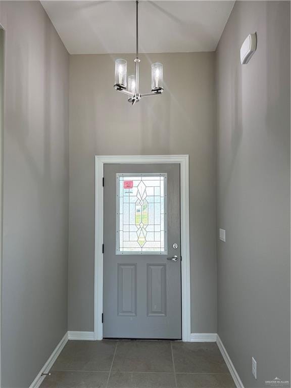 12711 N 37th Ln, Mcallen, TX 78504 - foyer featuring a chandelier and tile patterned flooring