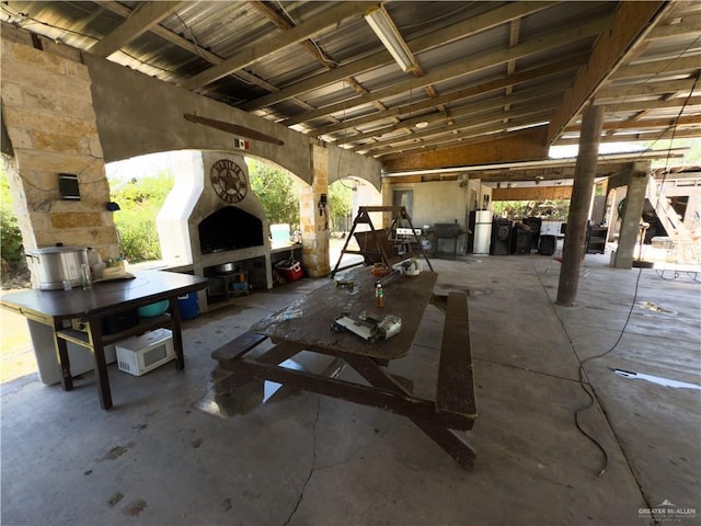 4810 Amber St, Mission, TX 78574 - view of patio with an outdoor stone fireplace