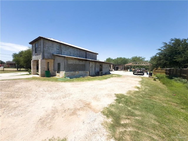 4810 Amber St, Mission, TX 78574 - view of outdoor structure featuring driveway