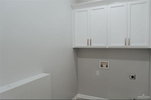 607 N 9th St, Alamo, TX 78516 - washroom with hookup for an electric dryer, cabinet space, and hookup for a washing machine