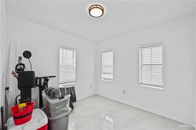 miscellaneous room featuring a wealth of natural light