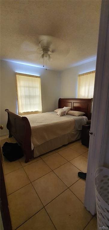 1319 Sago Palm St, Alamo, TX 78516 - bedroom featuring light tile patterned floors and a ceiling fan