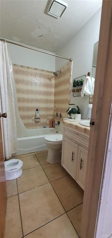 1319 Sago Palm St, Alamo, TX 78516 - bathroom featuring toilet, tile patterned flooring, shower / bathtub combination with curtain, and vanity