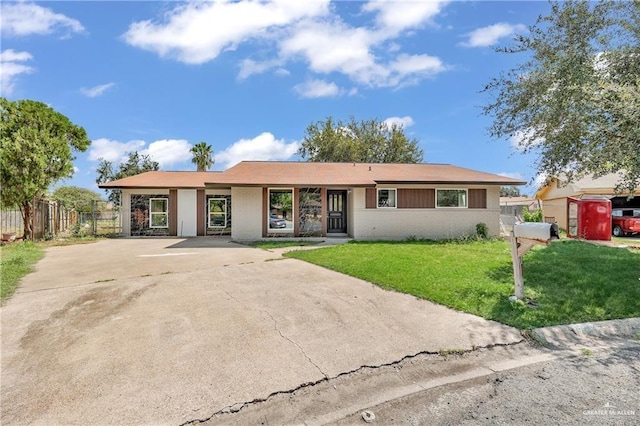 ranch-style house with a front yard