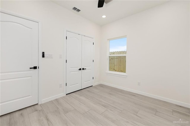 5204 Shalom Dr, Edinburg, TX 78539 - unfurnished bedroom with baseboards, recessed lighting, light wood-style flooring, a ceiling fan, and a closet