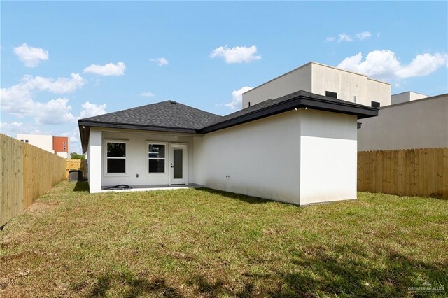5204 Shalom Dr, Edinburg, TX 78539 - rear view of house with cooling unit, stucco siding, and roof with shingles