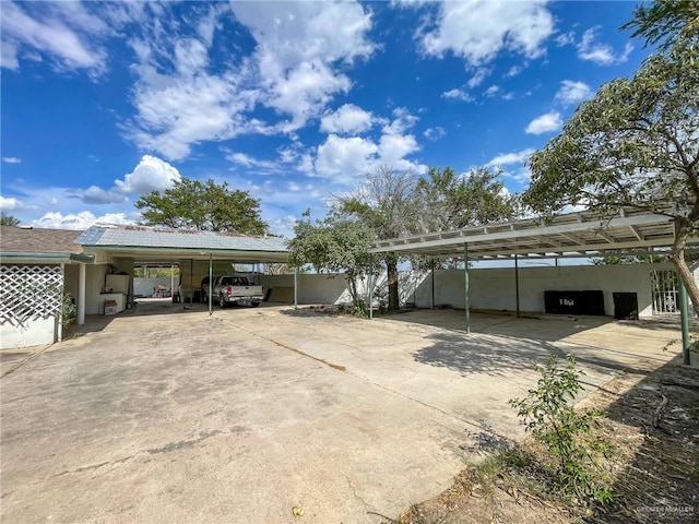 view of car parking with a carport