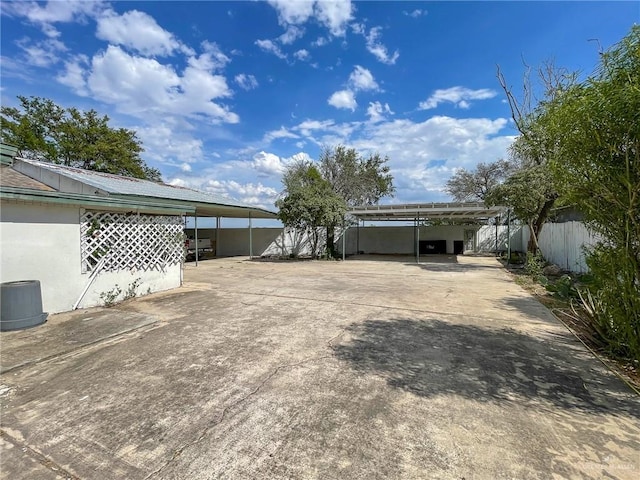 view of yard with a carport