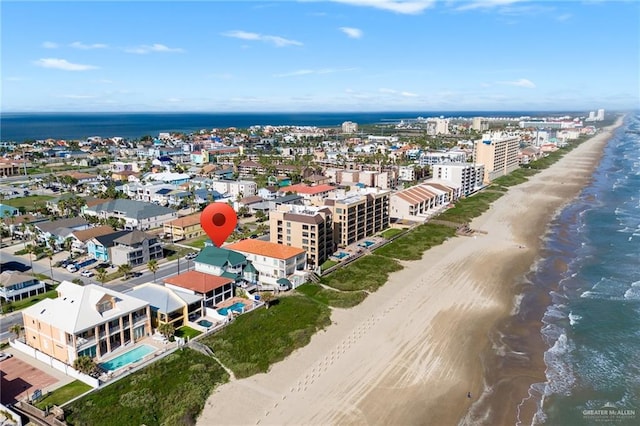 aerial view featuring a water view and a view of the beach