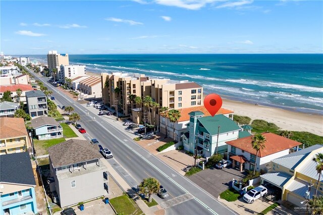 bird's eye view with a beach view and a water view