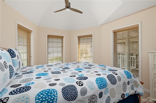 bedroom featuring ceiling fan and lofted ceiling