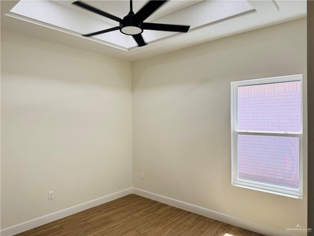 2125 Blue Sky Dr, Weslaco, TX 78599 - spare room featuring wood finished floors and a ceiling fan