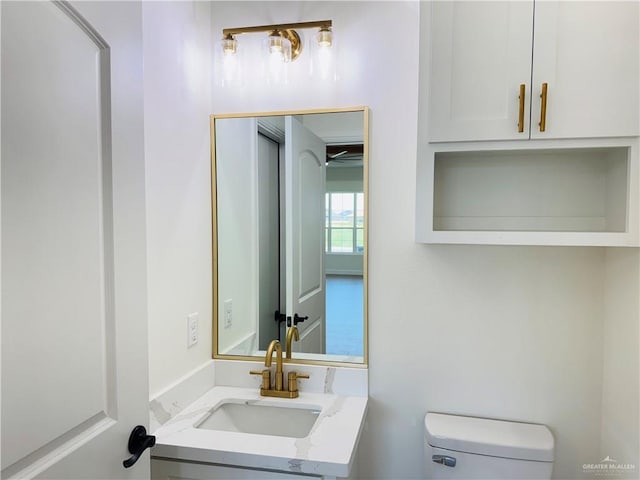 2125 Blue Sky Dr, Weslaco, TX 78599 - bathroom with toilet and vanity