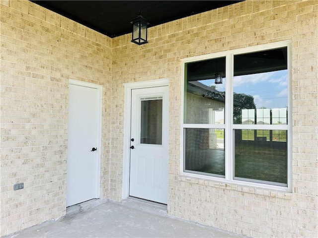 2125 Blue Sky Dr, Weslaco, TX 78599 - entrance to property with brick siding