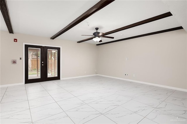 empty room with marble finish floor, baseboards, beamed ceiling, and french doors