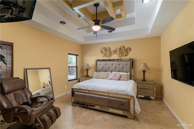 bedroom with ceiling fan, light tile patterned flooring, and a raised ceiling