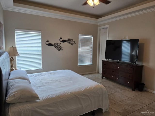 115 E Atol St Unit 3, South Padre Island, TX 78597 - bedroom featuring a raised ceiling, light tile patterned floors, crown molding, and a ceiling fan