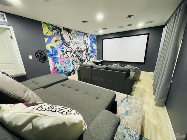 807 Walnut St, Mcallen, TX 78501 - home theater room with light wood finished floors and recessed lighting