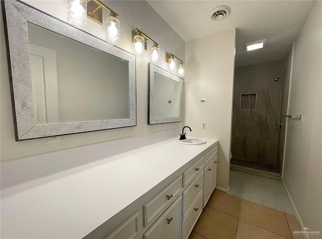 807 Walnut St, Mcallen, TX 78501 - bathroom featuring tile patterned floors, a shower stall, and vanity