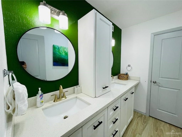 807 Walnut St, Mcallen, TX 78501 - full bath featuring double vanity and wood finished floors