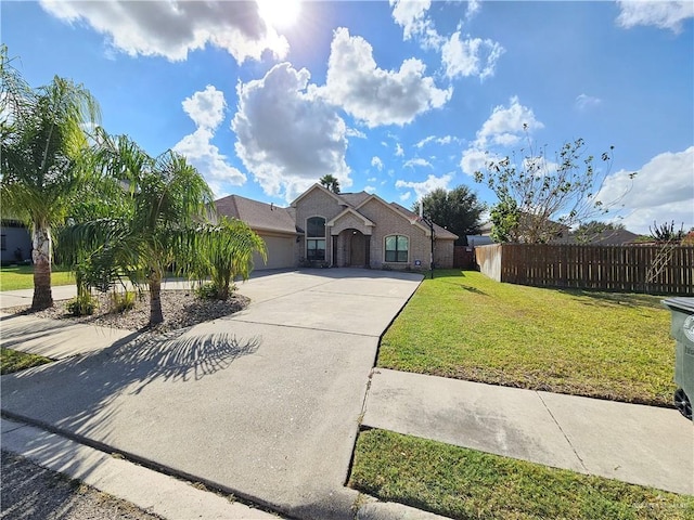 1704 E 30th St, Mission, TX 78574 - view of front of house featuring driveway and a garage