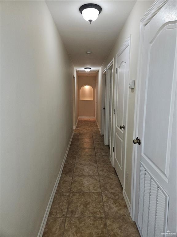 1704 E 30th St, Mission, TX 78574 - corridor with baseboards