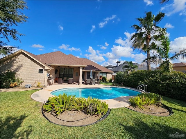 1704 E 30th St, Mission, TX 78574 - view of pool with a patio and a lawn