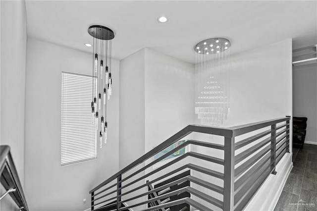 stairway featuring hardwood / wood-style floors