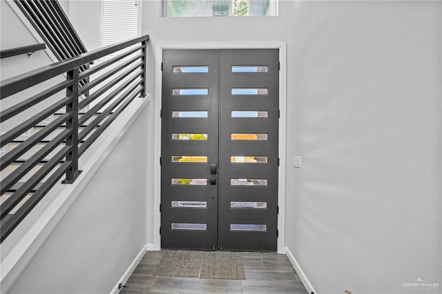 entrance foyer featuring dark wood-type flooring