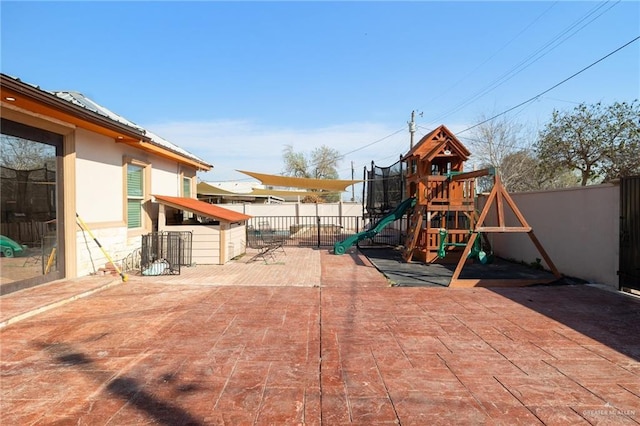 view of patio featuring a playground