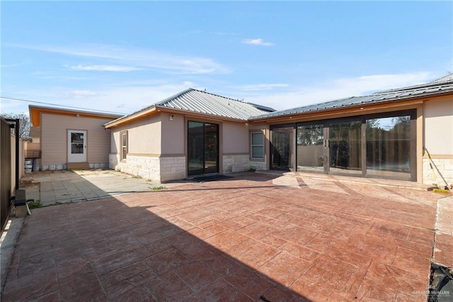 back of house featuring a patio