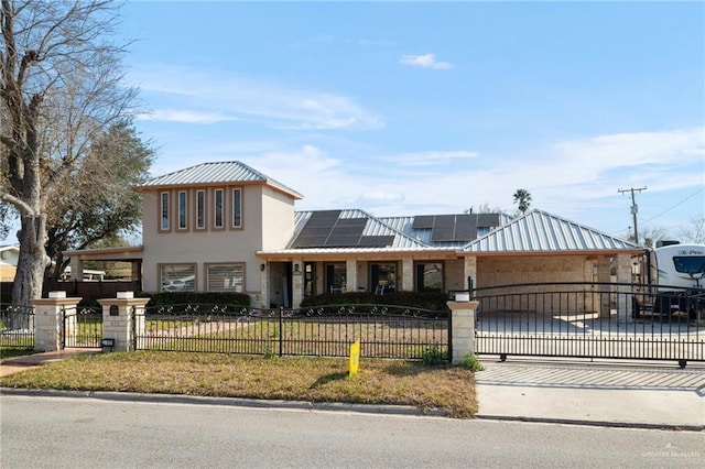 view of front of house with solar panels