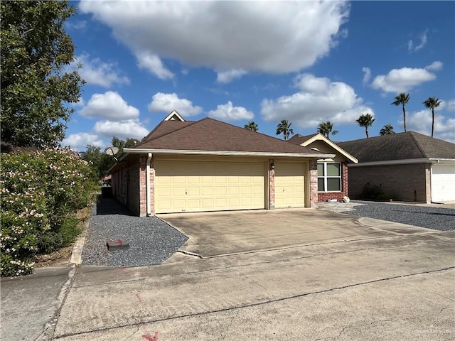 ranch-style home with a garage