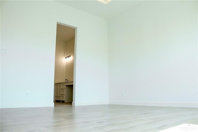 1904 Trophy Dr, Edinburg, TX 78542 - unfurnished room with light wood-style floors and baseboards