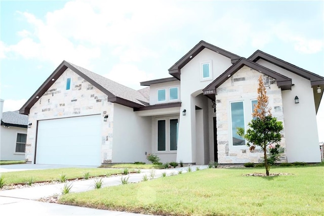 1904 Trophy Dr, Edinburg, TX 78542 - view of front of property featuring stone siding, a garage, a front lawn, and stucco siding