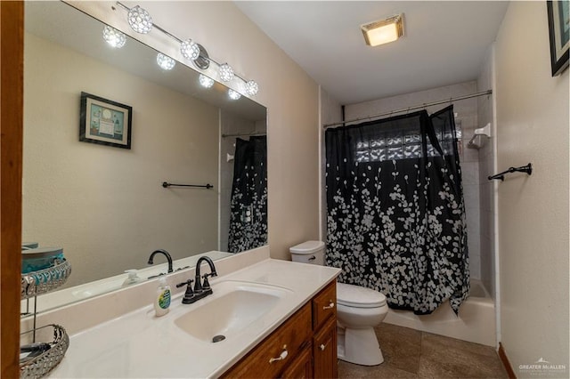 full bath featuring toilet, tile patterned flooring, shower / bath combo, and vanity