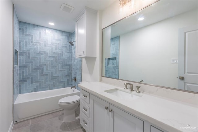 bathroom with tile patterned flooring, visible vents, toilet, vanity, and  shower combination