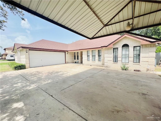 view of property exterior featuring a garage