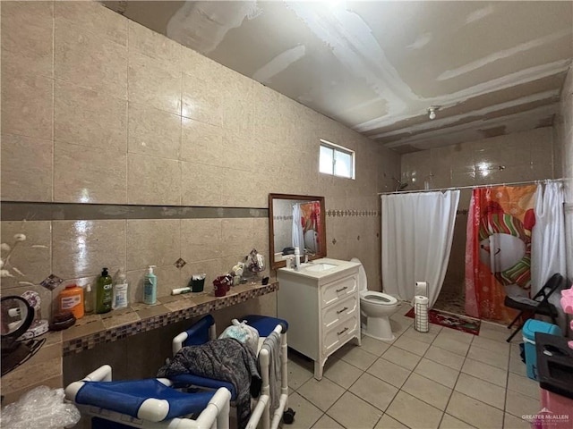 16805 Las Canas Dr, Edinburg, TX 78541 - miscellaneous room with tile walls, light tile patterned flooring, and a sink