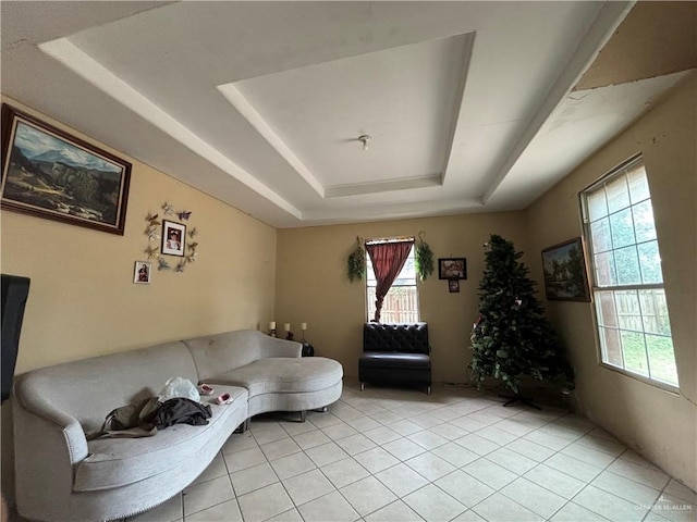 16805 Las Canas Dr, Edinburg, TX 78541 - living room with a tray ceiling and light tile patterned flooring
