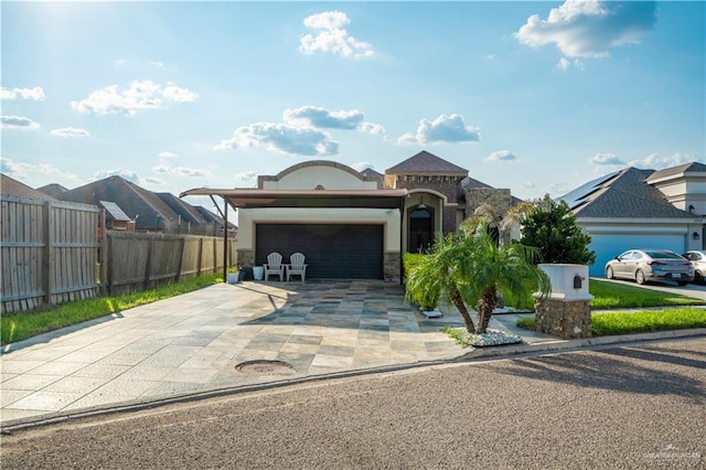 view of front of home with a garage