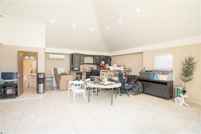 tiled dining room with high vaulted ceiling and a wall unit AC