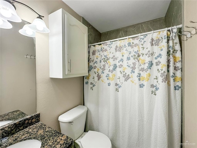 1003 Thornwood Dr, Mission, TX 78574 - full bathroom featuring vanity, toilet, and a shower with curtain