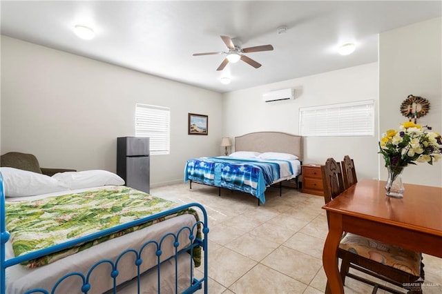 bedroom featuring light tile patterned flooring, a wall mounted air conditioner, stainless steel fridge, and ceiling fan